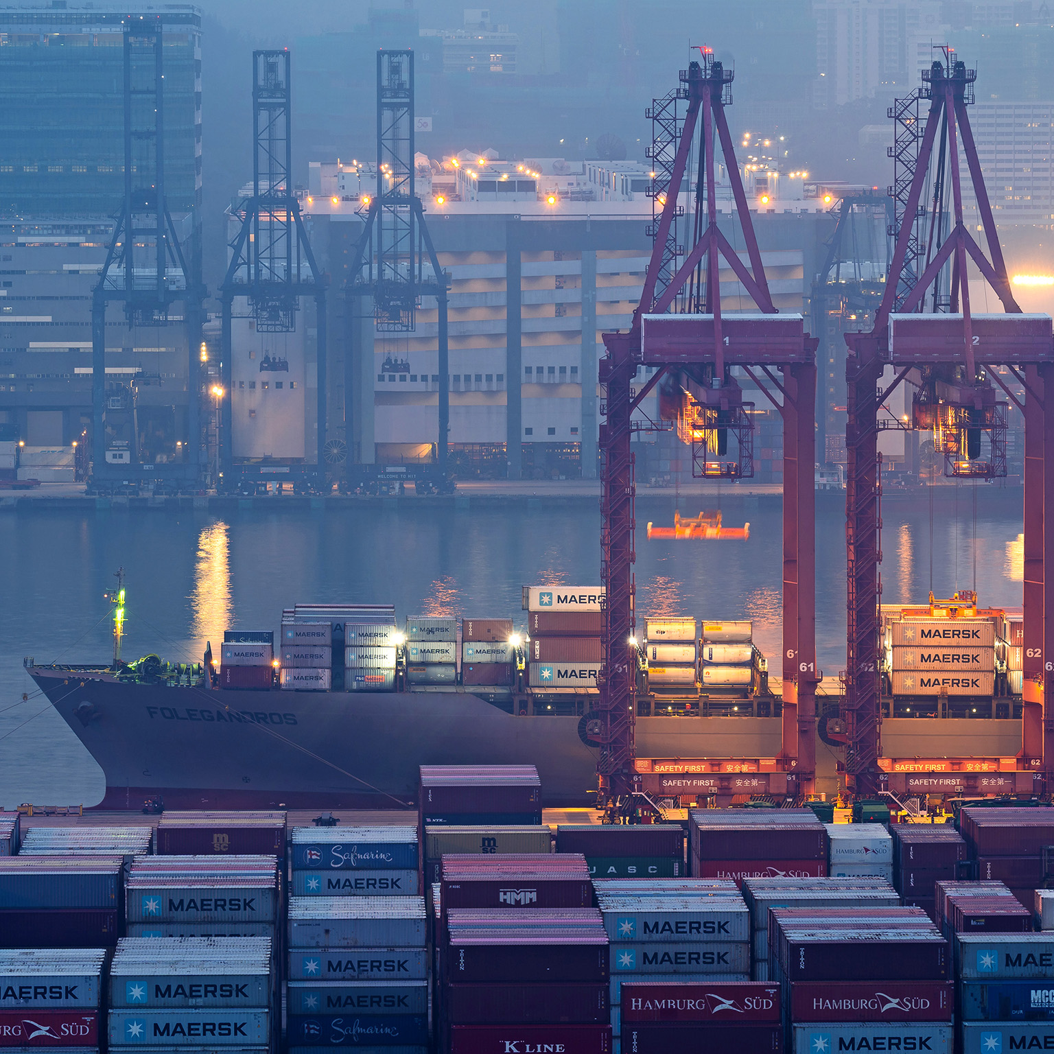 Cranes loading containers at a port