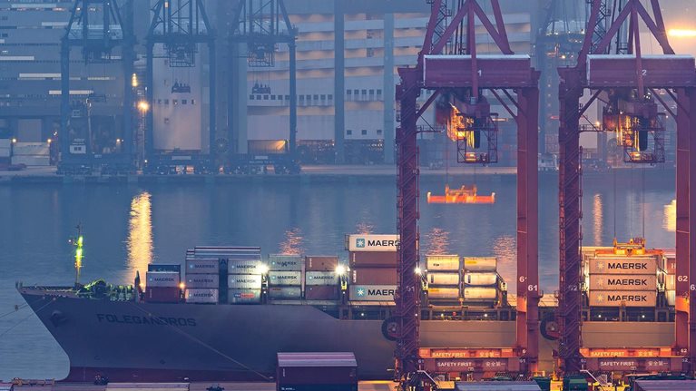 Cranes loading containers at a port