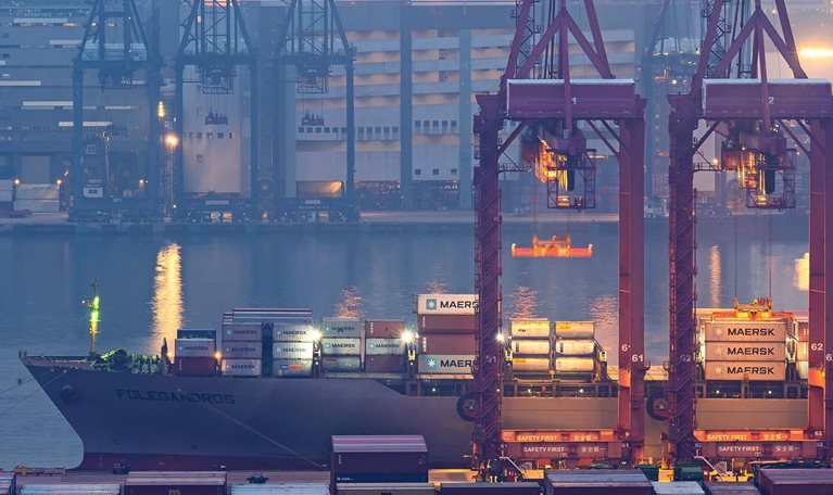 Cranes loading containers at a port