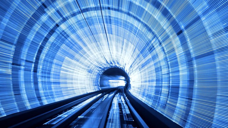 Abstract background light waves in deep tunnel as seen from a train in Shanghai, China