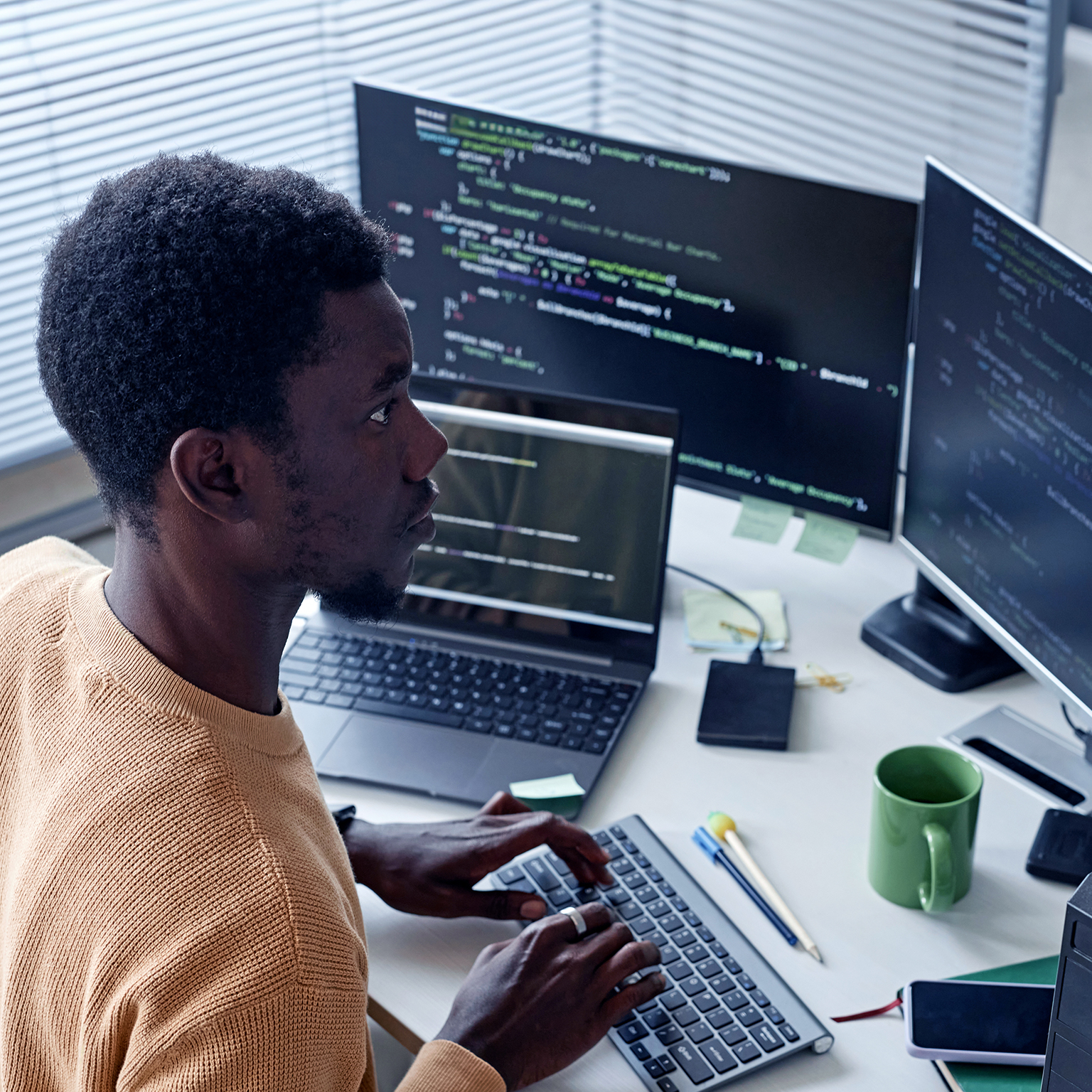 Developer working with security codes on computer