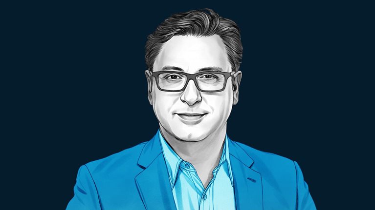 A hand-drawn illustration of Paul Hudson, smiling and wearing a button-down shirt and blazer. The drawing features precise lines and subtle shading, using black and white tones for her face and blues for her attire.