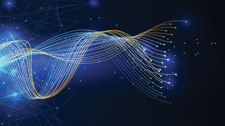 Multicolored lines coming together in a single line against a dark blue background