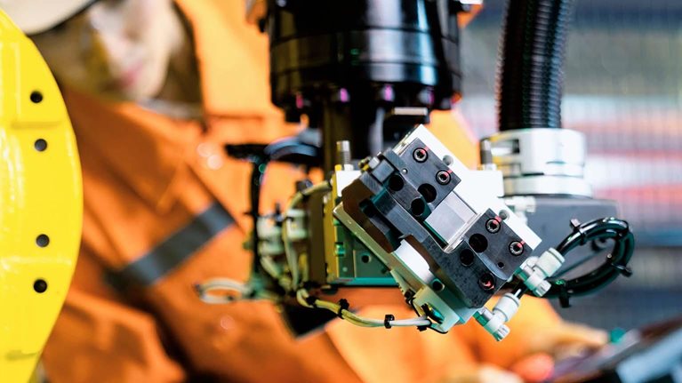 Woman working machinery