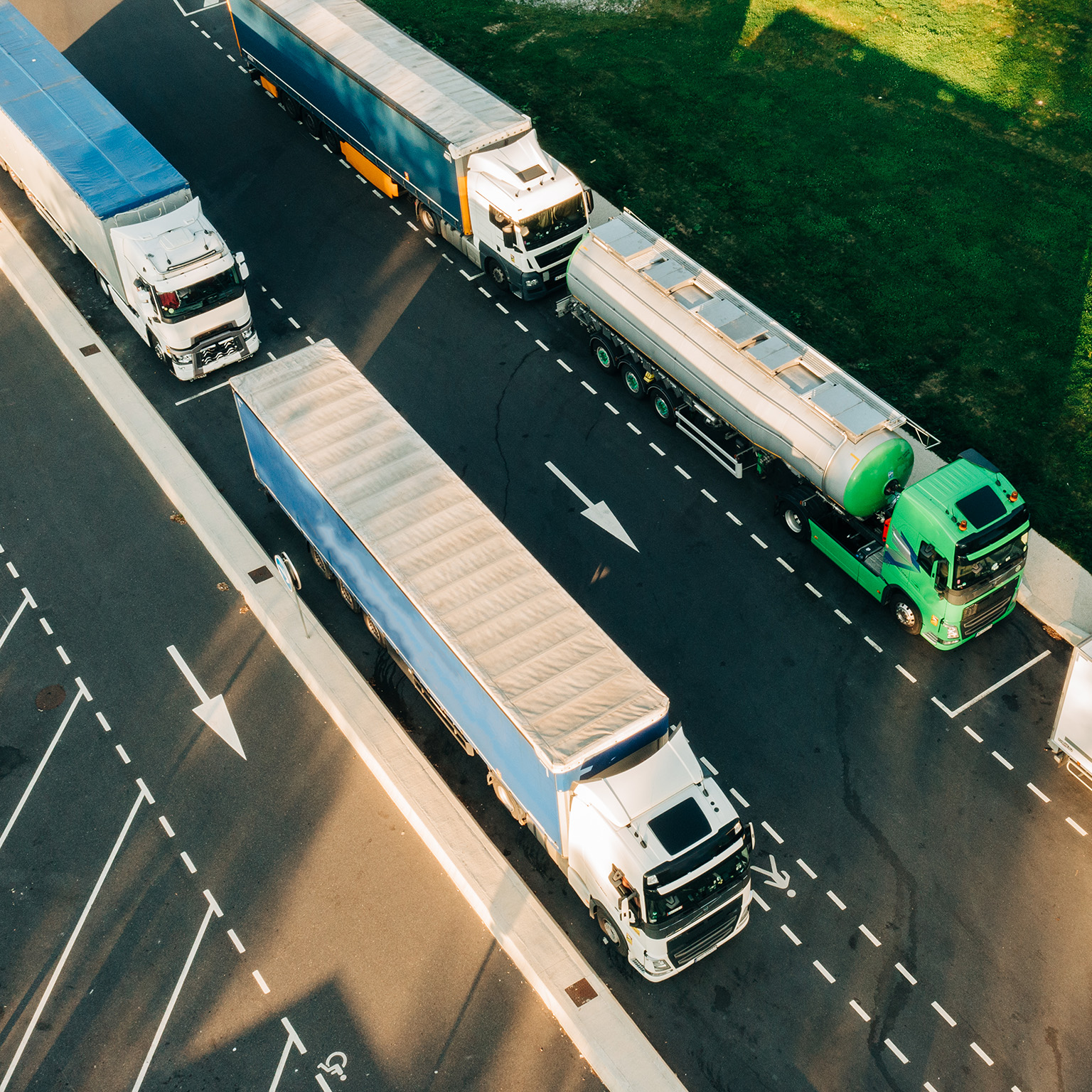 overhead view of hydrogen supply trucks on road photo