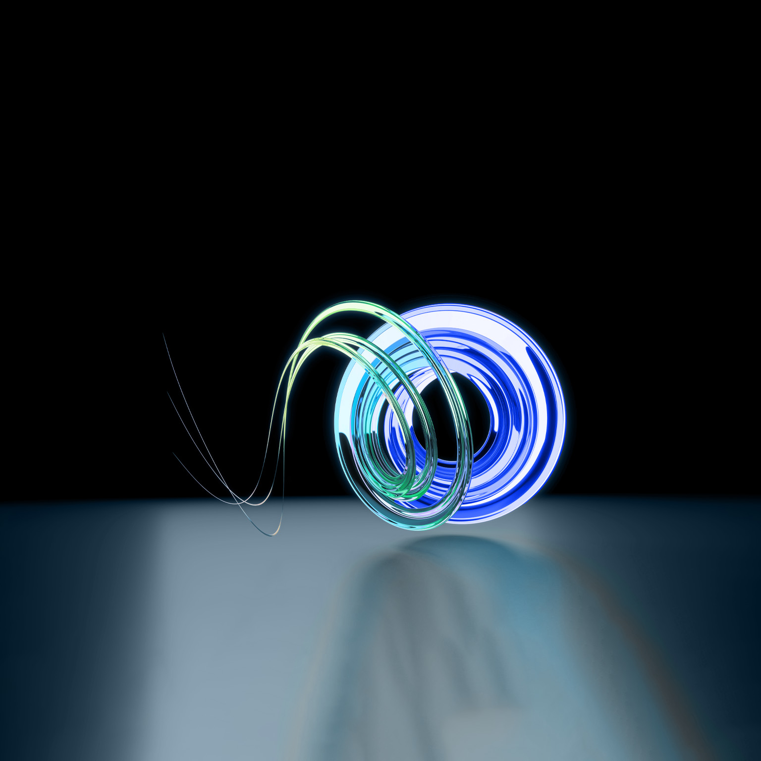 A circular arrangement of intertwining tubes made of luminous teal and blue glass, placed on a backdrop of deep blue.