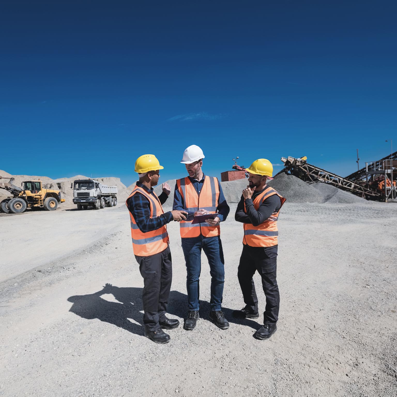 Workers in an industrial field