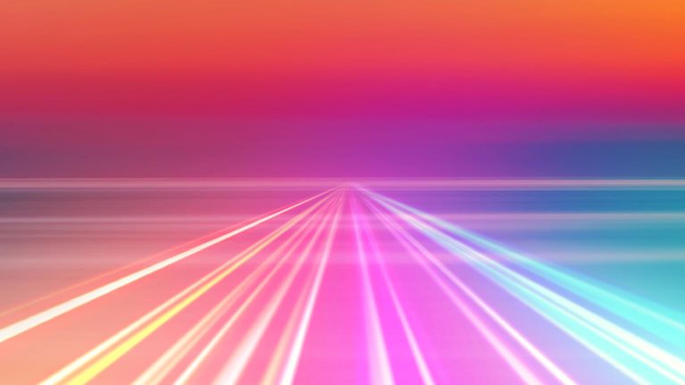 Abstract picture of colorful light trails crossing twilight sky with fast motion.