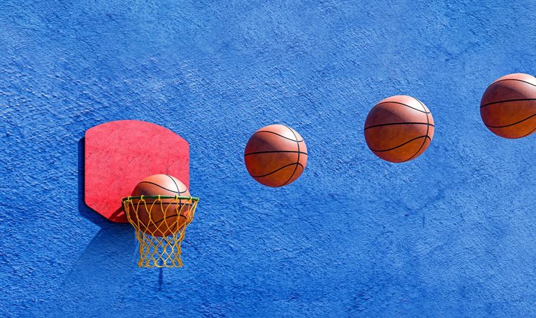 Image sequence of 4 basketballs flying through the air and going into a hoop.