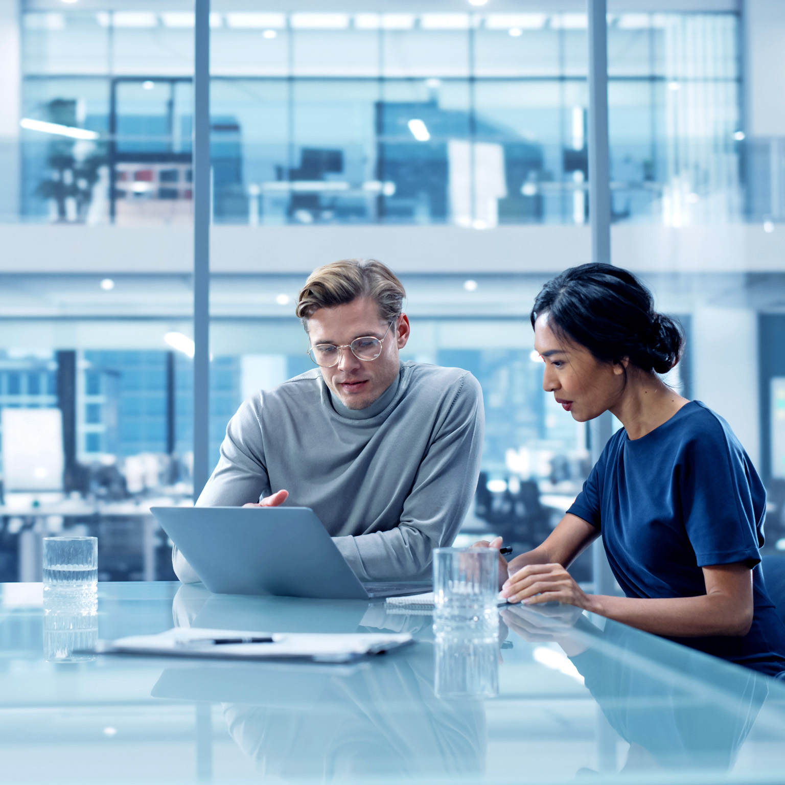 Business people working in a modern office setting