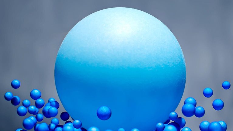 A 3D illustration of a large blue ball splashing into many, much smaller, blue balls