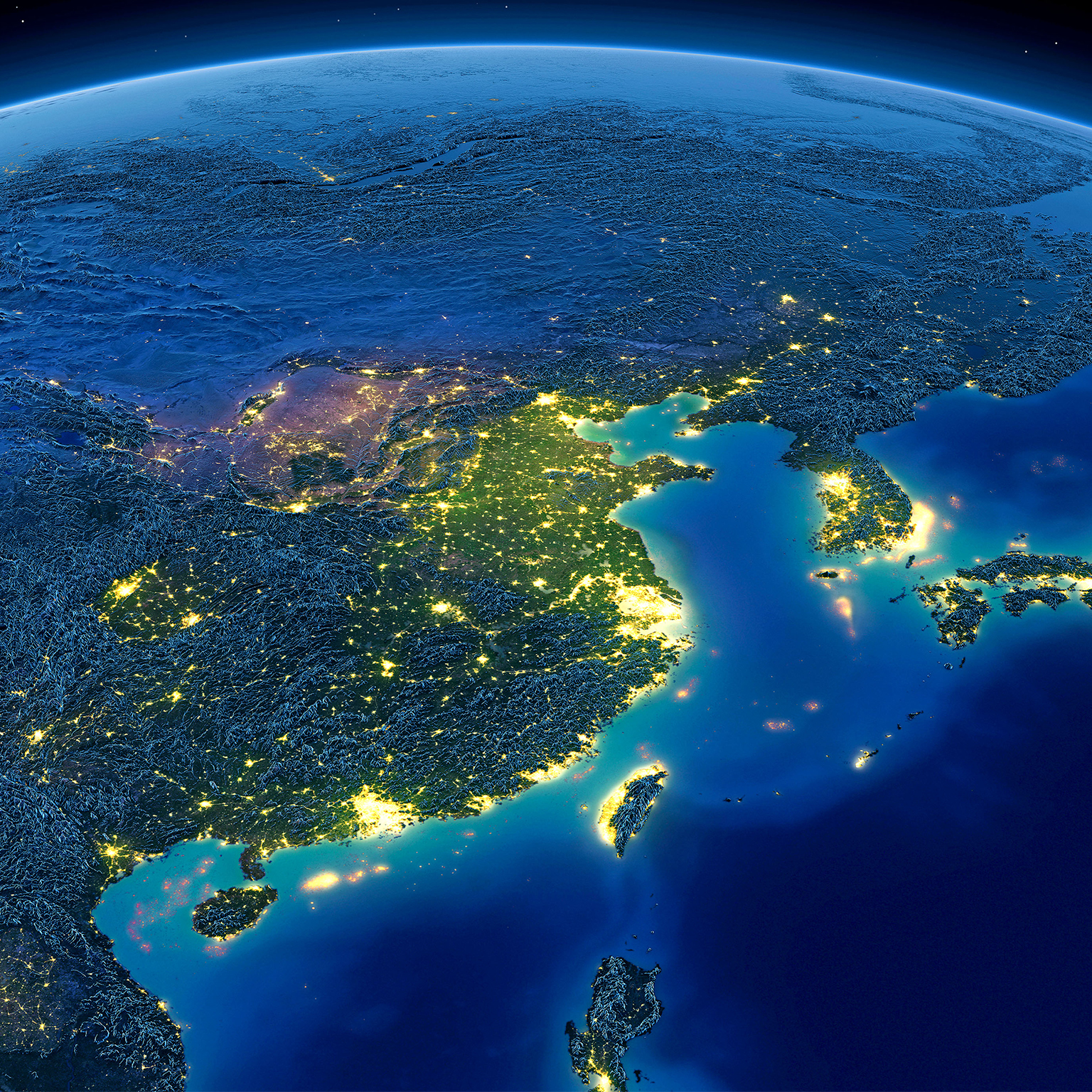 Satellite image of Earth at night with a focus of illumination on Asia