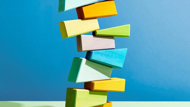 Unstable stack of multi-colored geometric blocks