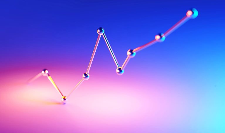 Single line graph illuminated by blue and magenta lights on blue and magenta background.
