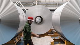 Worker walking in the factory