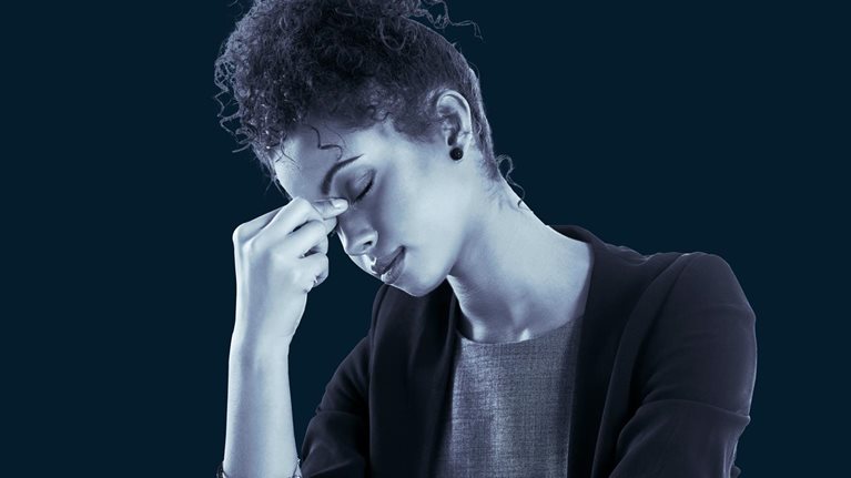 Businesswoman looking fatigued