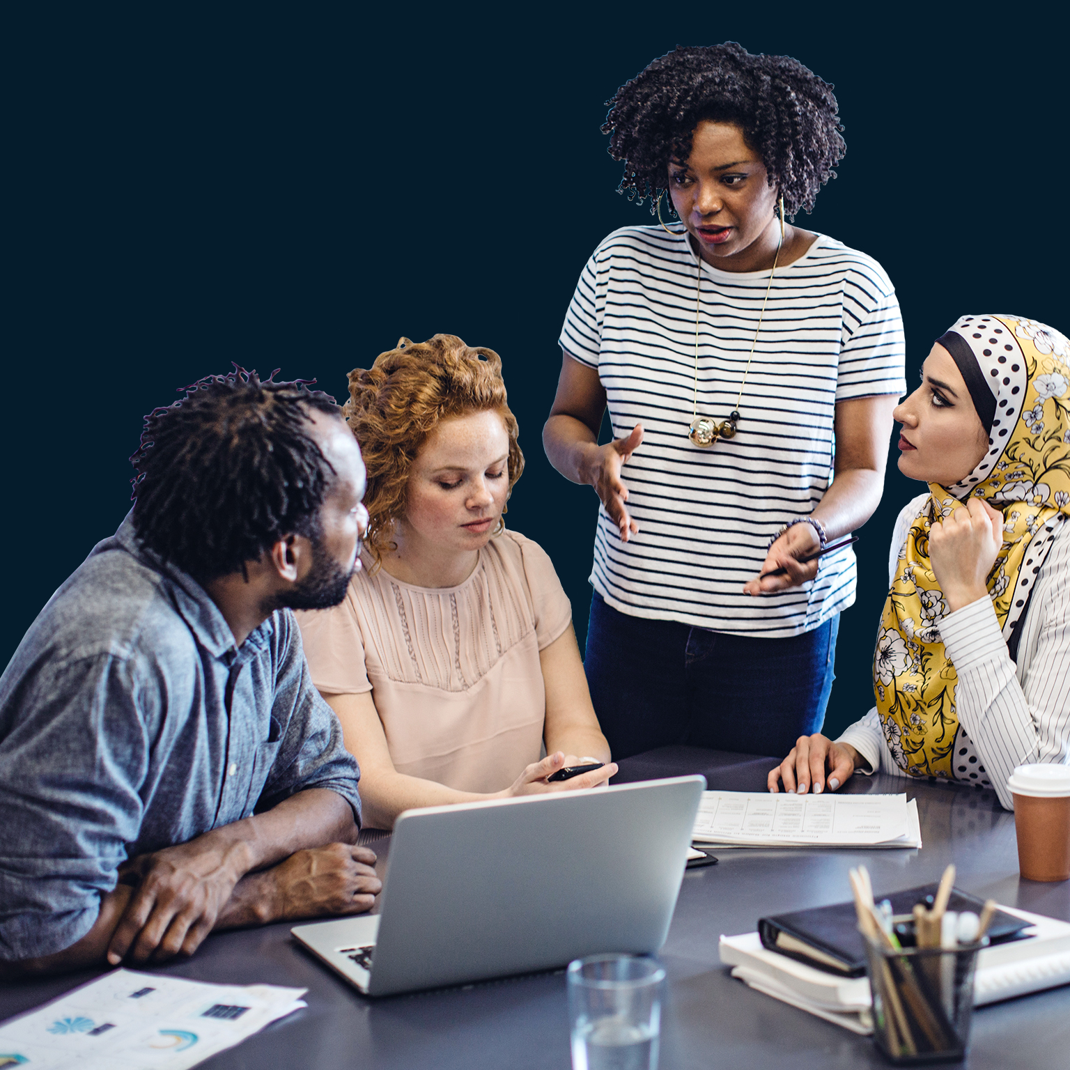 Diverse group of business people having discussion during meeting in office