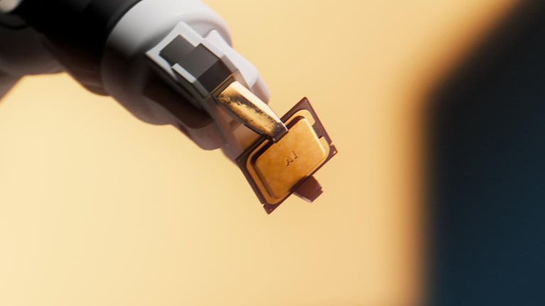 The image shows a micro-electromechanical or semiconductor component, appearing to be a miniature surface-mount electronic package or packaged sensor held by a vacuum pick-and-arm tool during automated assembly.