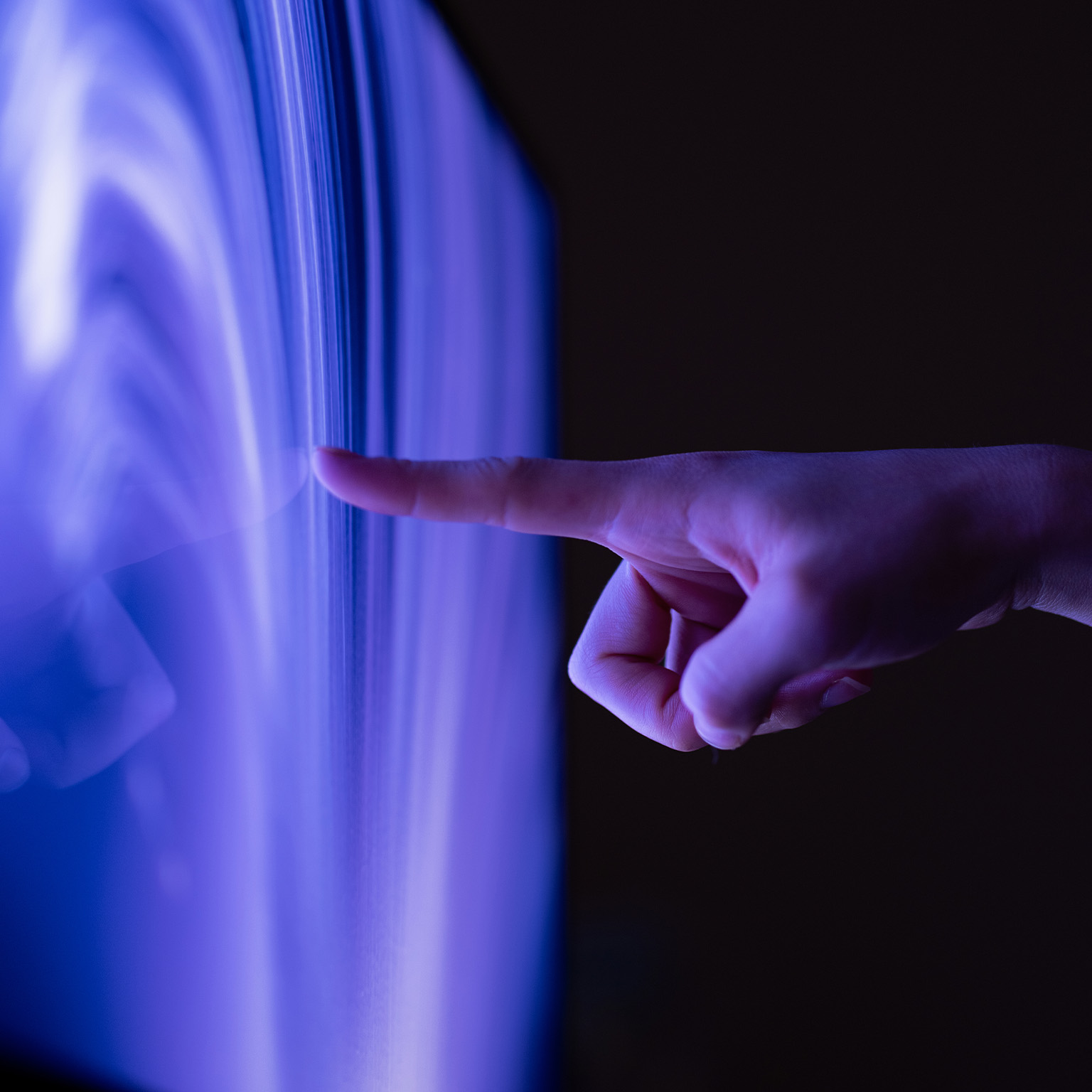 Connect to the future, Close-up of extended finger clicking computer screen