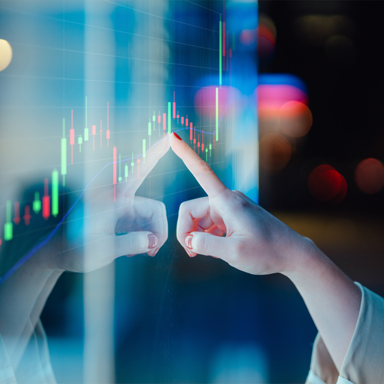 Businesswomen touching stock market graph on a virtual screen display - stock photo