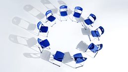 Circle of blue chairs