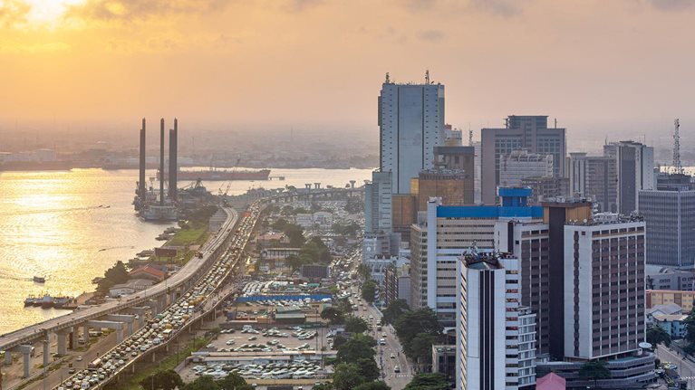 Sunset over Lagos Island - stock photo