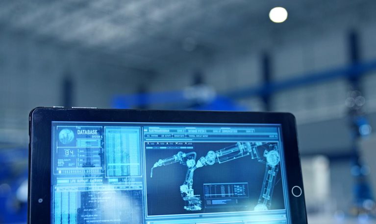 Robot arm being tested by professional development engineer