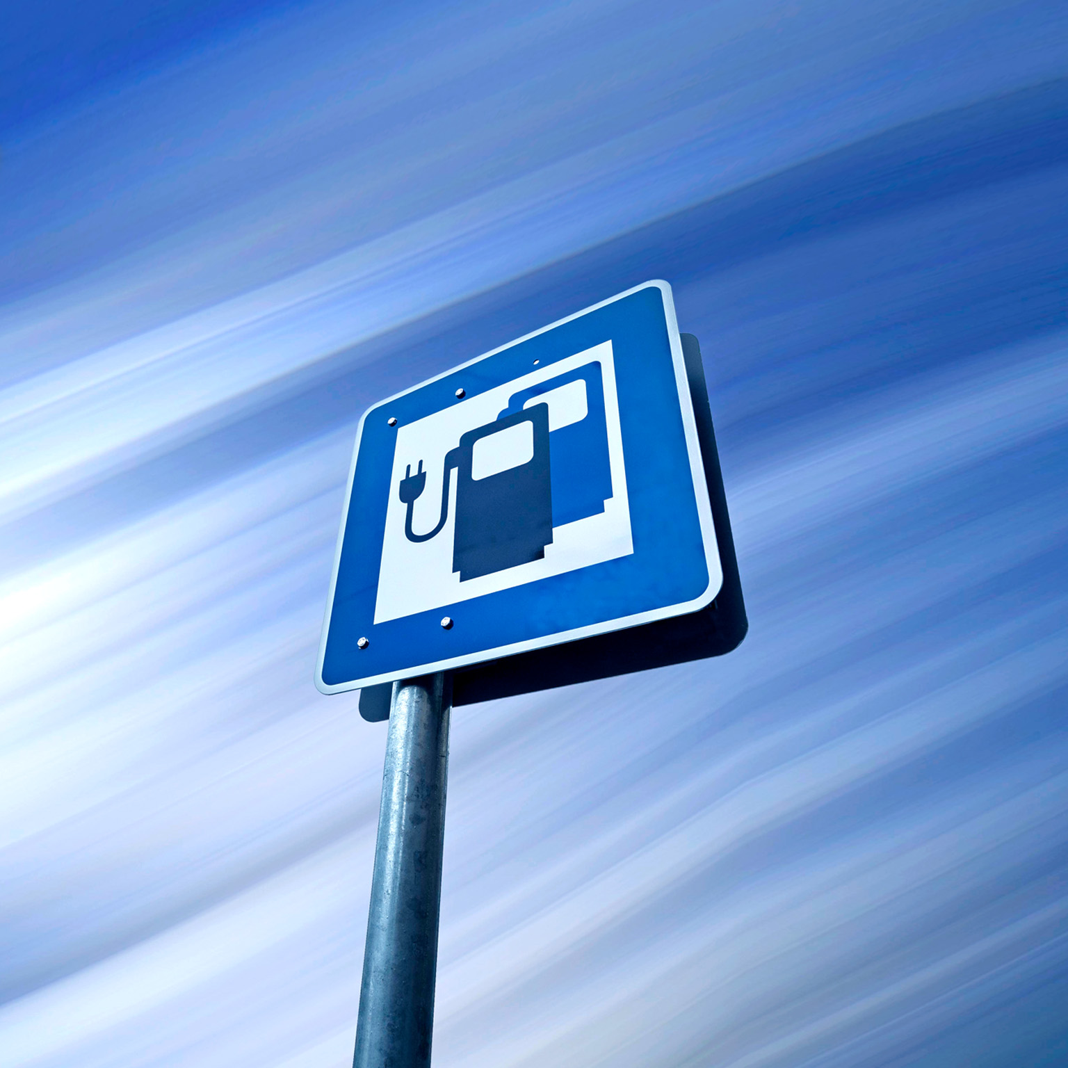  A road sign with an icon for an electric car charging station in Germany 