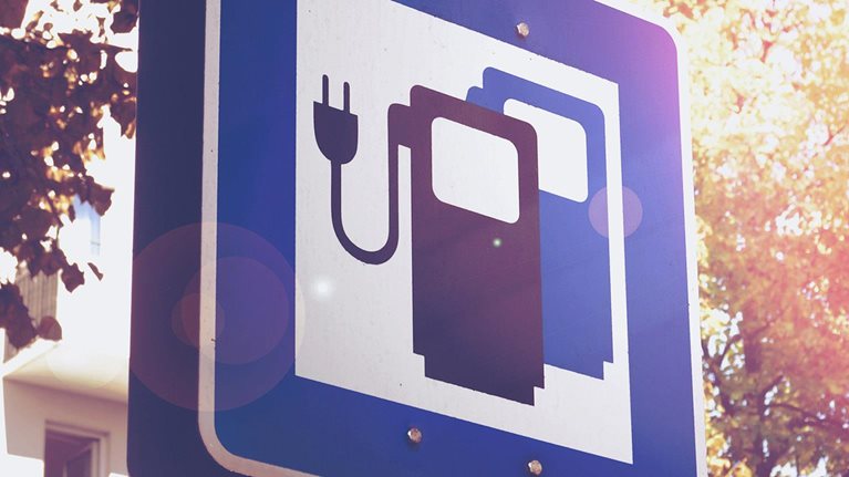 Expanding electric-vehicle adoption despite early growing pains