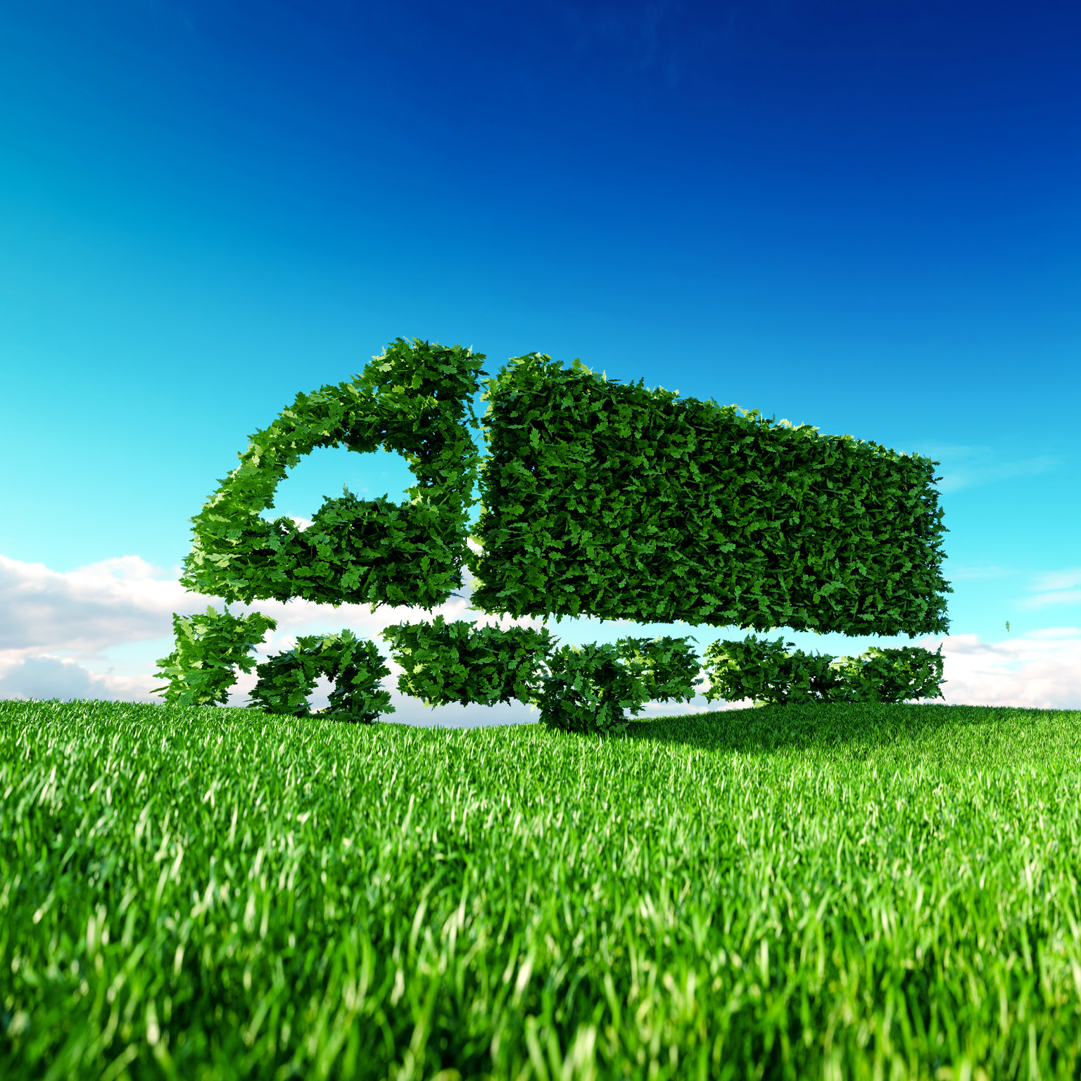 3D rendering of green green truck icon on fresh spring meadow with blue sky in background.