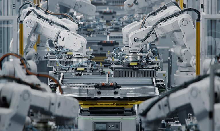 Lithium-Ion EV Battery Pack Production at Large Automated Assembly Line at Bright Factory Equipped With Industrial Robot Arms. Electric Car Manufacturing.