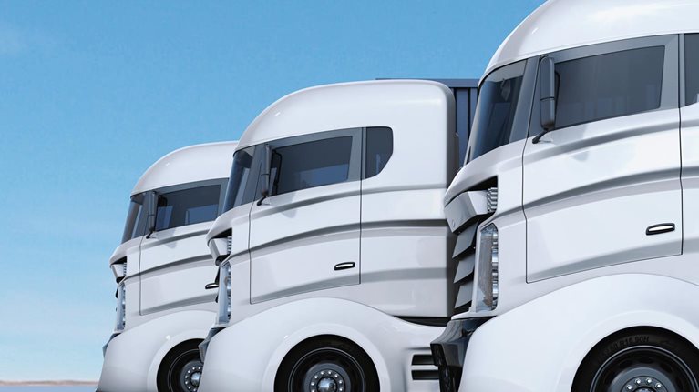 Trailer trucks lined up.