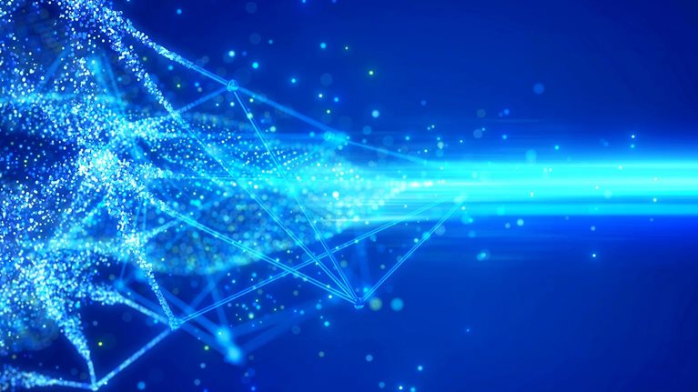 Light blue digital light points and beams against a dark blue background indicating network data transfer speed