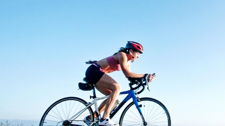 Woman competing in triathlon