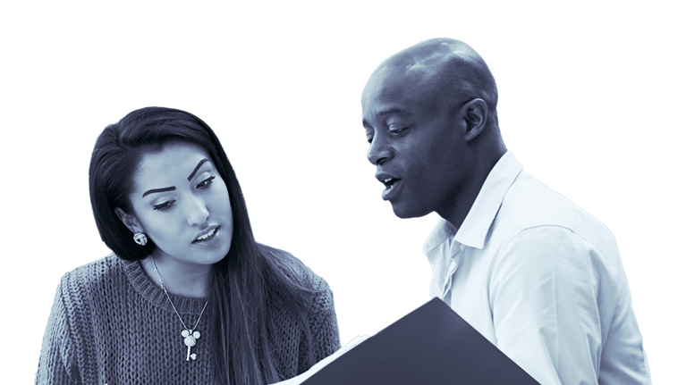 photo man and woman looking in binder