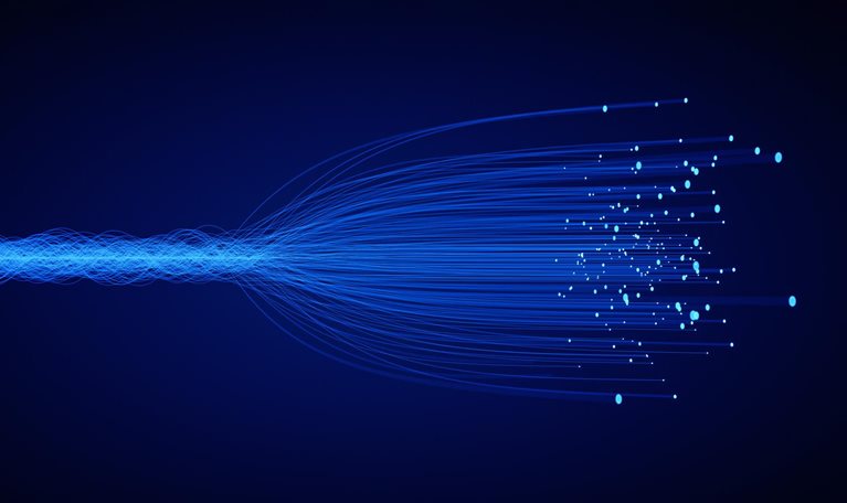 Filaments of light that go from a compact collection to a dispersed array.