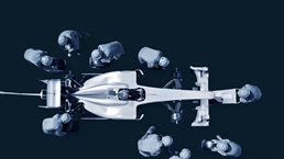 Race car drivers around a pit stop