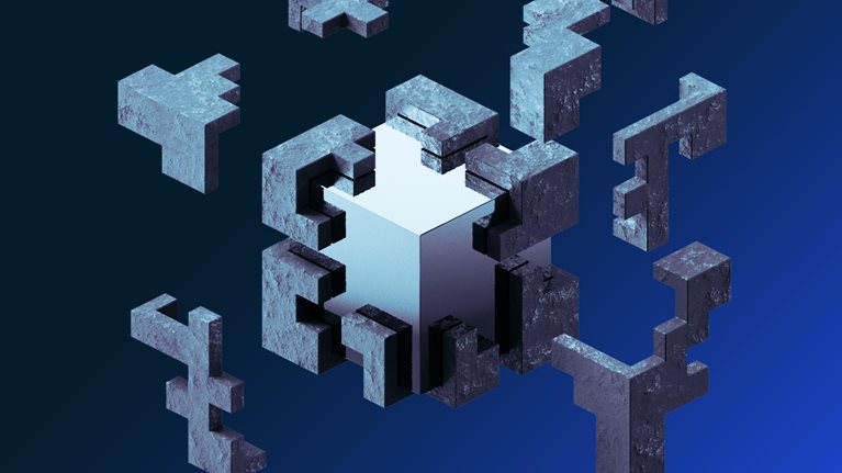 Shiny cube in concrete cover that is breaking away in clean blocks