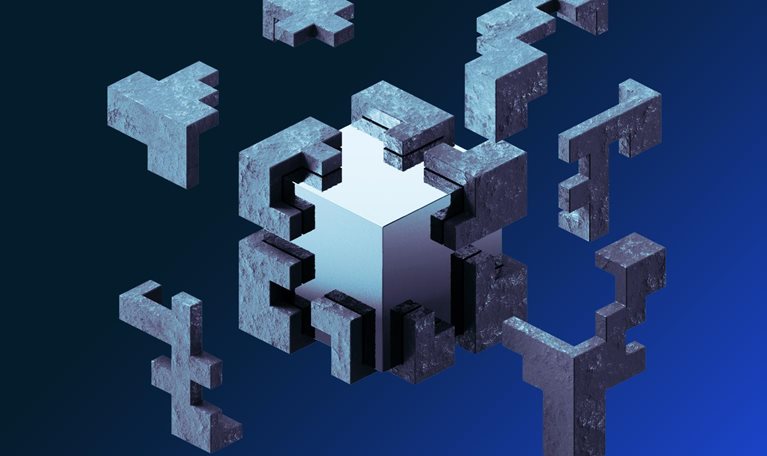 Shiny cube in concrete cover that is breaking away in clean blocks