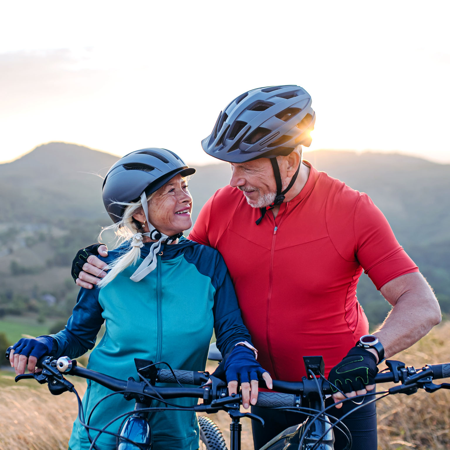 Portrait of senior couple on a bike ride in nature.