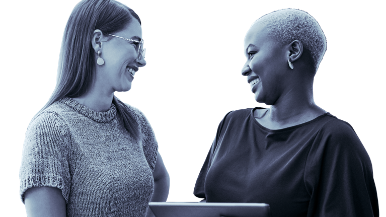 Shot of two businesswomen working together on a digital tablet in an office