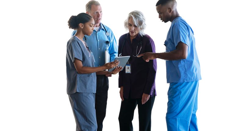 Doctors and nurses discussing digital tablet - stock photo