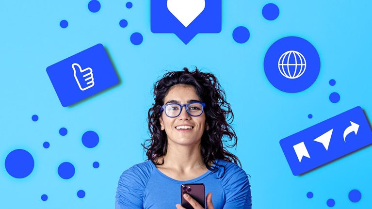 A young smiling woman with curly hair and glasses holds a smartphone against a bright blue background. Surrounding her are various social media icons, suggesting engagement and online interaction.