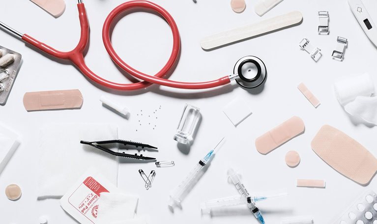 Variety of medical supplies on white background