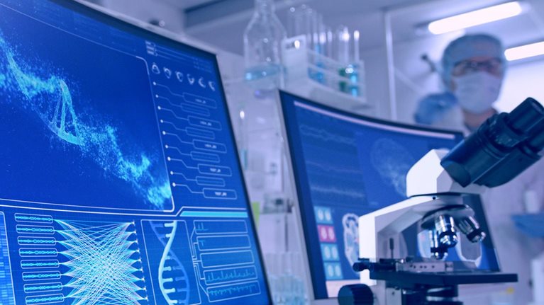 Futuristic laboratory equipment. Rear view of scientist during DNA research