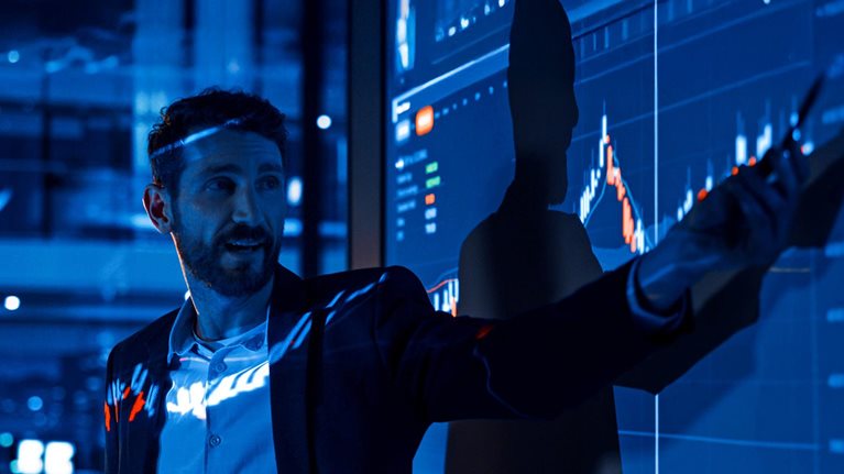 Business conference meeting presentation: Businessman does analysis talks to group of business people.