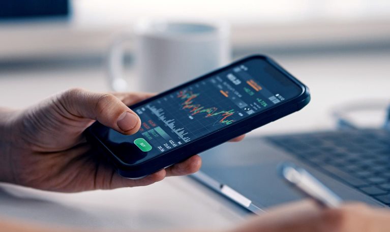 Man checking financial information on a smart phone