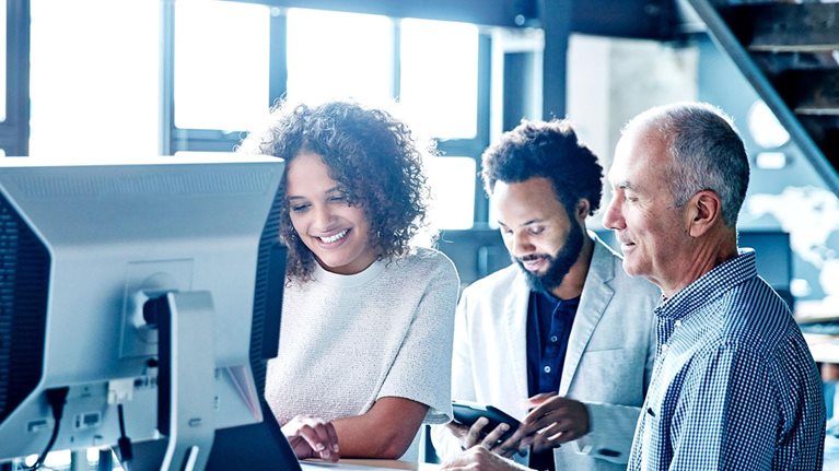 People working with technology