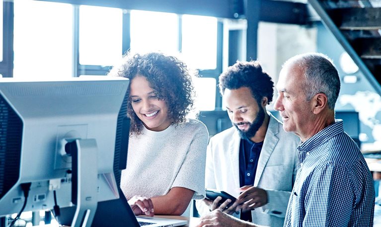 People working with technology