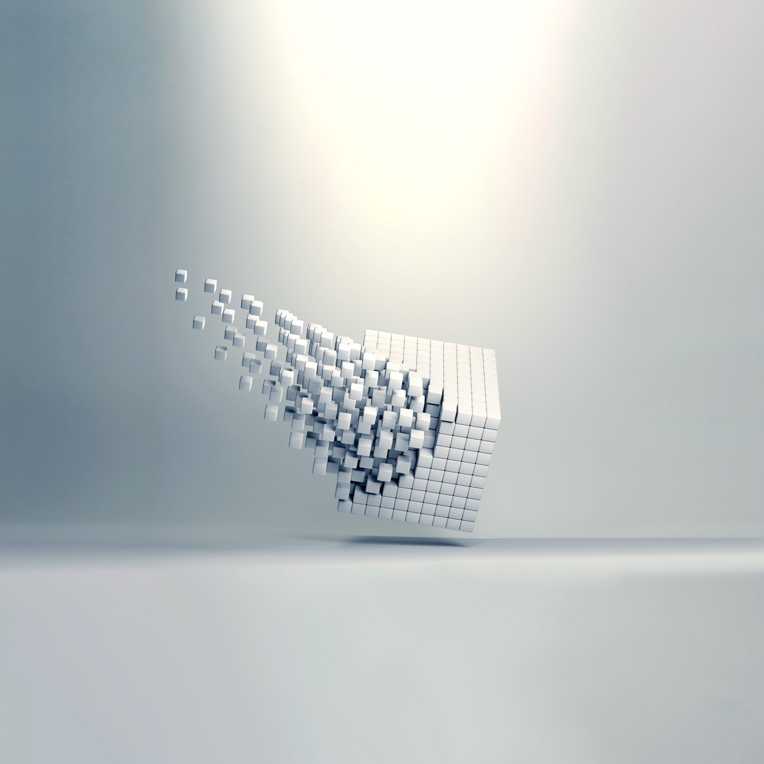 A 3D cube made up of multiple smaller cubes, one corner of the cube explodes outward in an organized but energetic manner. 